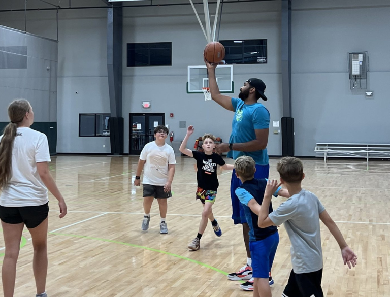 Ralph Sampson instructing basketball clinic