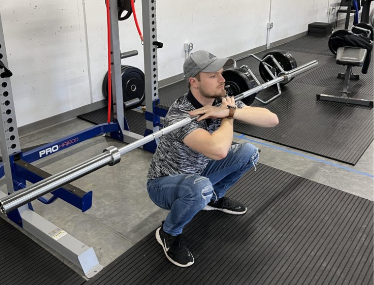 Jackson Lohr demonstrating squatting techniques