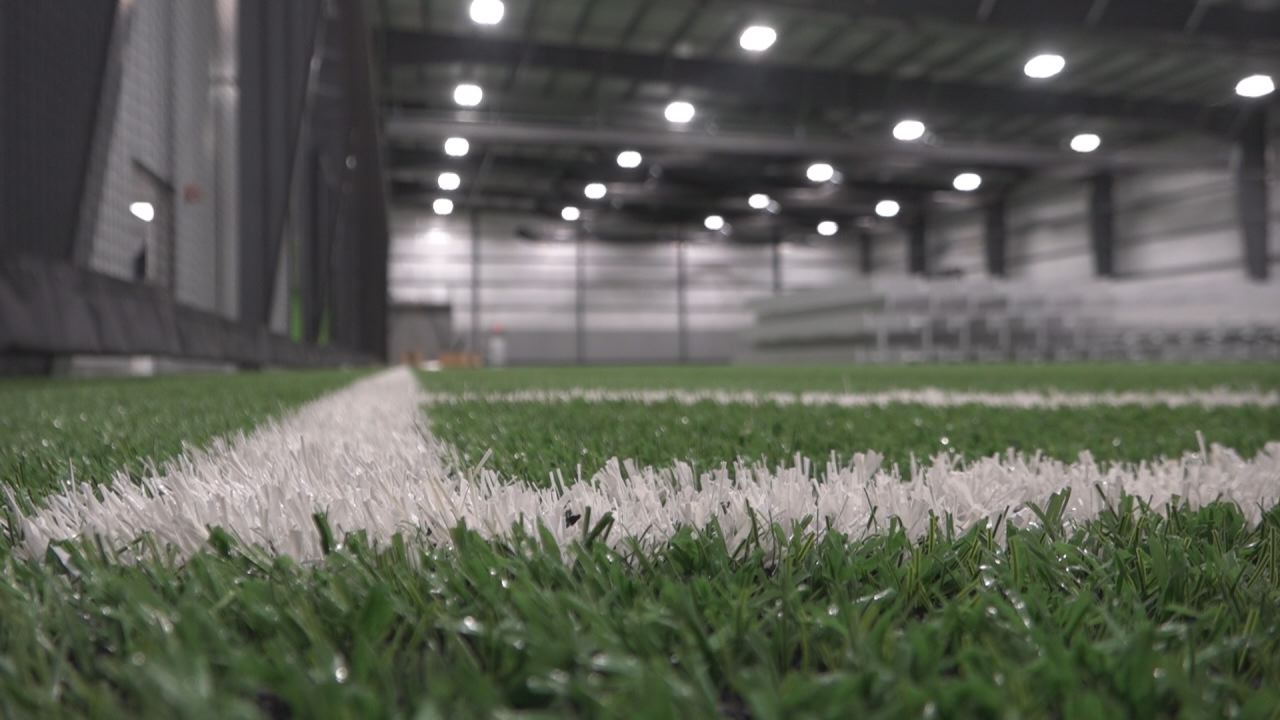 close up view of indoor turf field at horizons edge sports campus